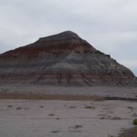 Layers show climate: if dry, iron rusts; if wet, it turns blue, gray, purple