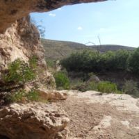 Bob approaching cave