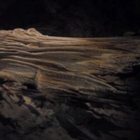 Draperies form when water runs down a gently sloping ceiling