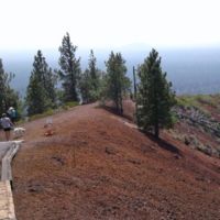 The trail runs atop the rim of the crater.