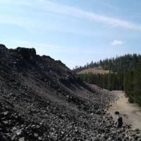 the outside of the flow, to the right of the stairs