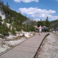 Sally & John; steam arises from vents all around.
